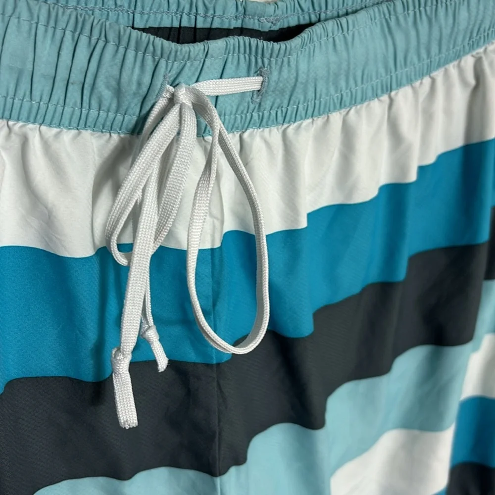 ATHLETA lined swim shorts size Large striped shorts elastic waist drawstring